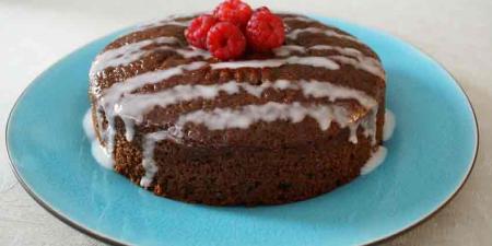 Picture of chocolate cake with raspberries on top